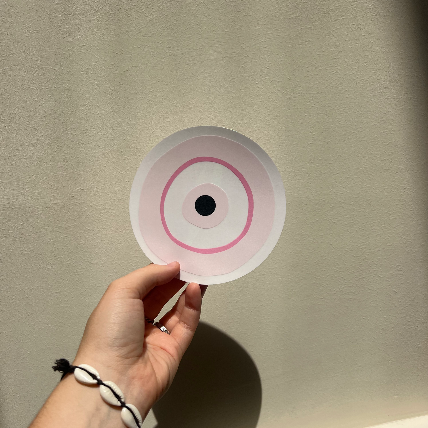 Autocollant rose de capteur de soleil de protection des yeux maléfiques